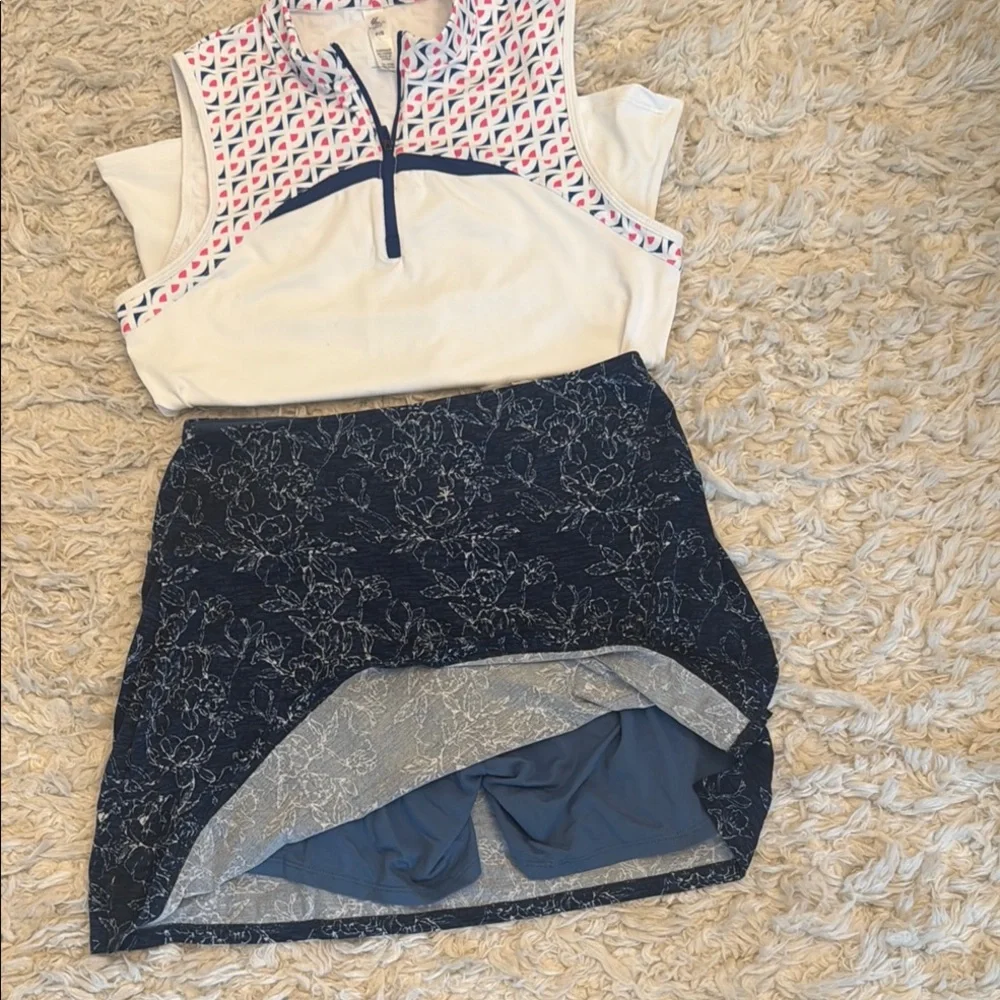 Sleeveless White and Navy Golf Outfit
Skirt with attached shorts - Picture 2 of 5